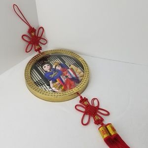 Asian doll hanging wall art
